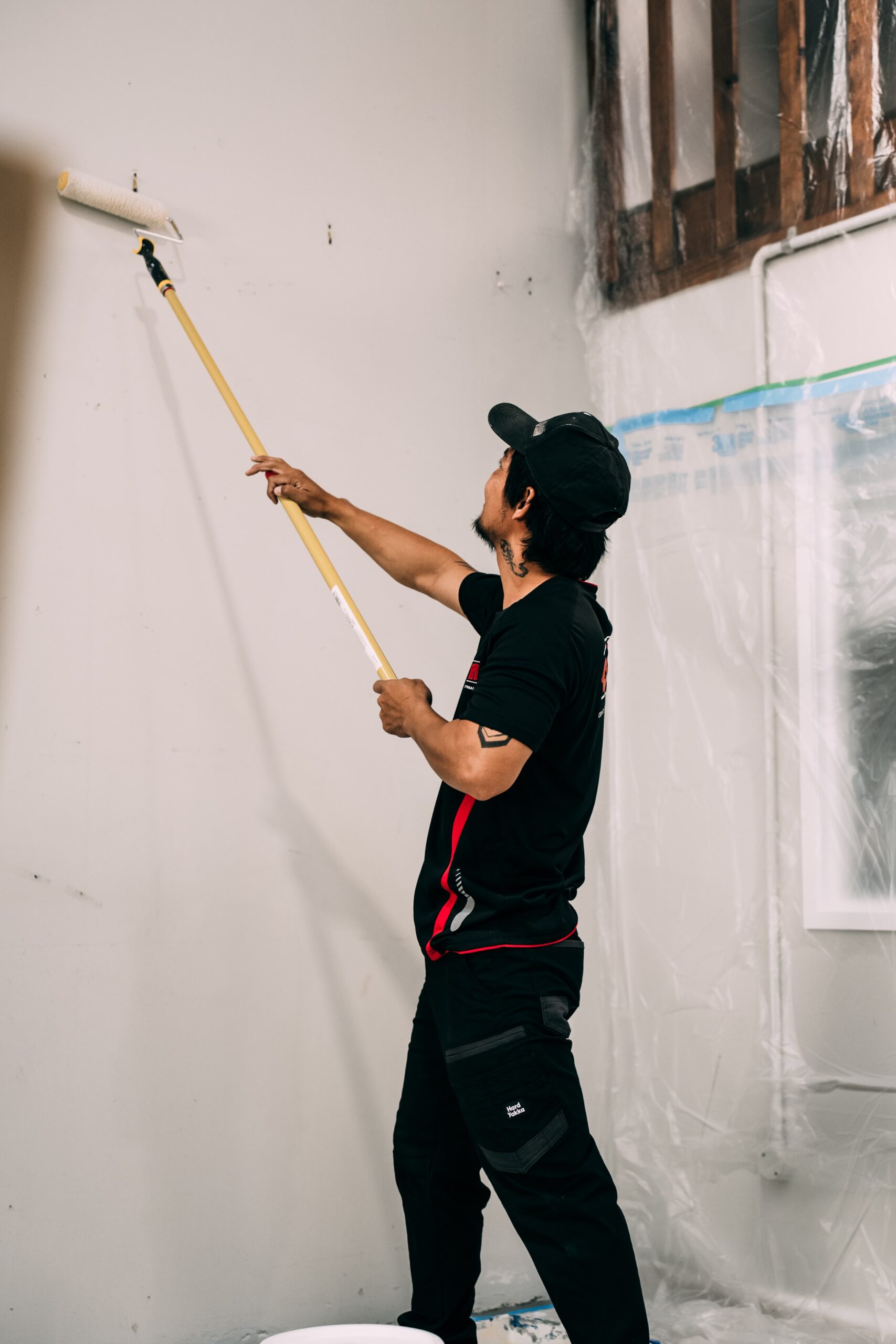 worker painting wall